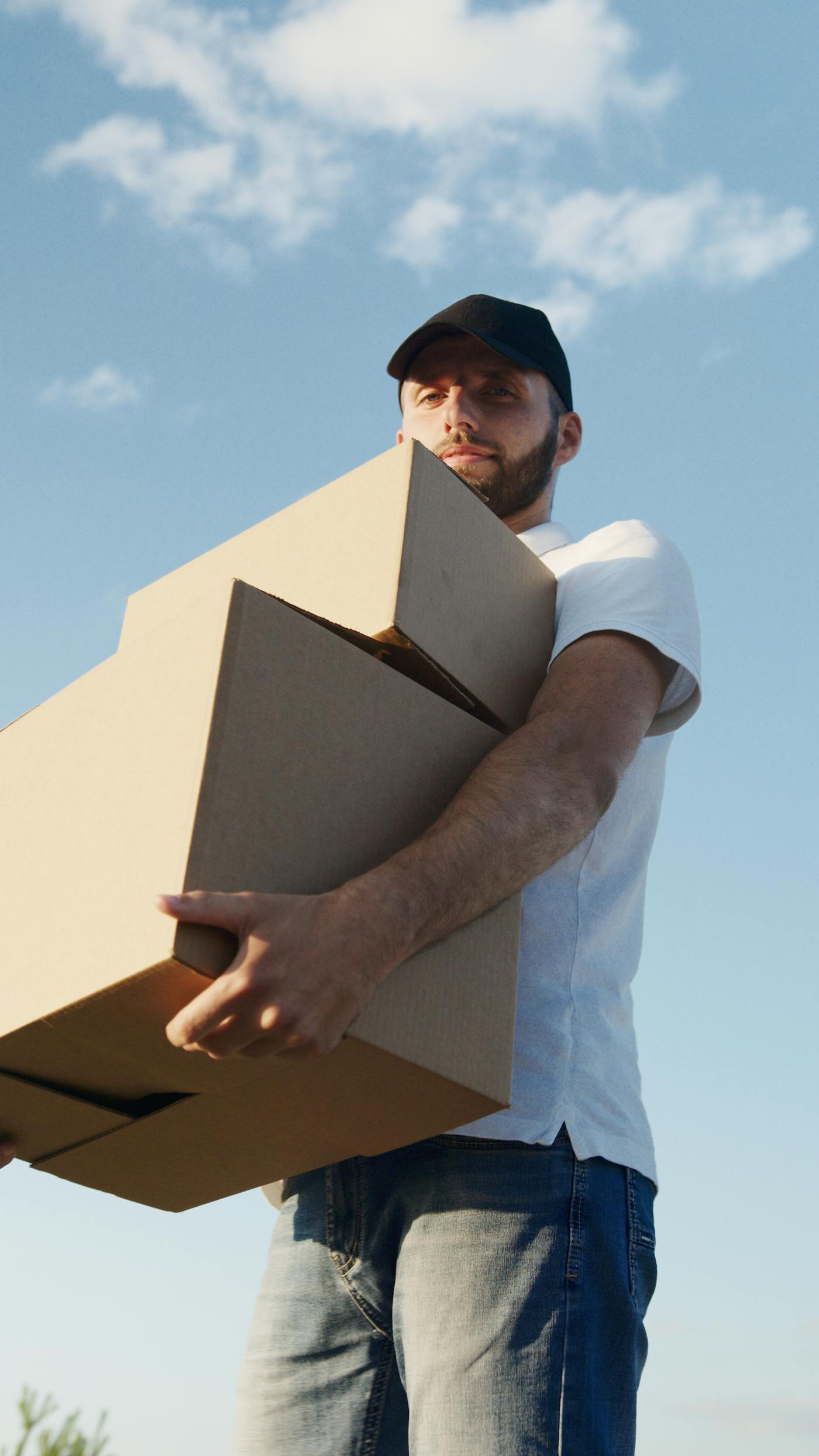 HomeTeam Moving moving truck and crew on a job in the Orlando area